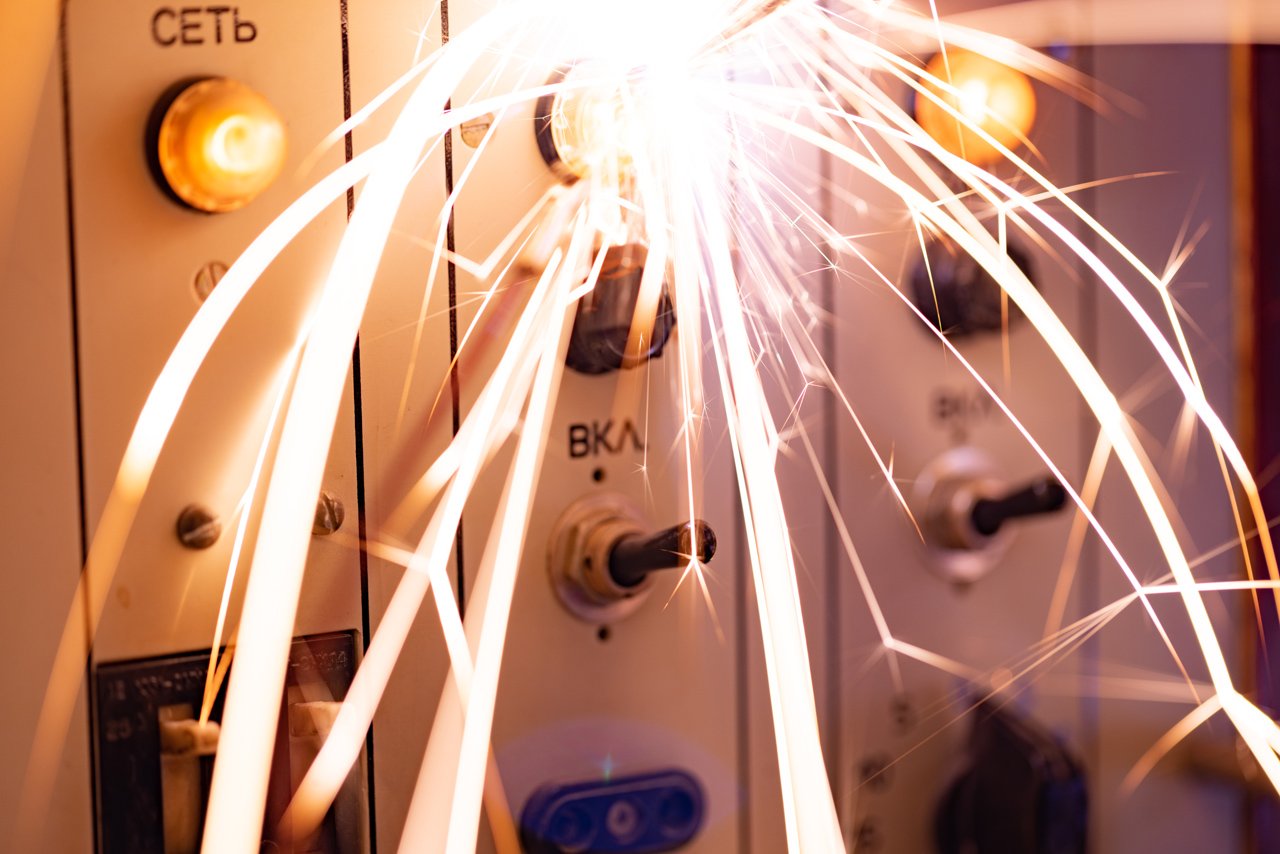 Electronic sparks scatter quickly and sharply from a short circuit on technological equipment in the instrument room Understanding Shock Hazard Boundaries in Arc Flash Protection