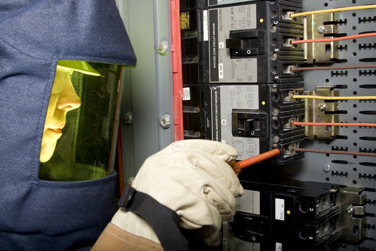 Female Electrician with Protective Clothing Choosing the Right PPE for Electrical Safety
